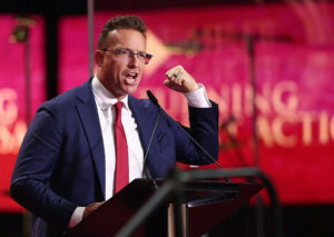 MAGA Influencer Benny Johnson Posts AI Video of Himself Dressed As Batman Assaulting Migrants